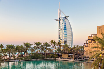 Image showing Dubai landmark, seven star luxury hotel Burj Al Arab at dusk, UAE