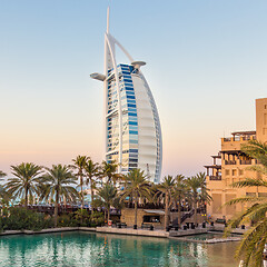 Image showing Dubai landmark, seven star luxury hotel Burj Al Arab at dusk, UAE