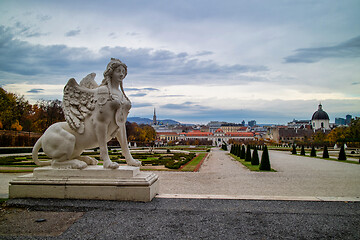 Image showing Marble statue of Woman Sphinx on a parapet of Belvedere Palace in Vienna.