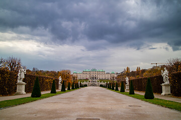 Image showing View of Schloss Belvedere Palace with walking alley and ancient statues in Vienna.