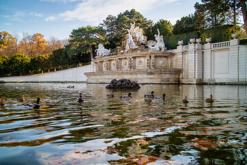 Image showing Monument with ancient statues and pond with floating ducks in Vienna.