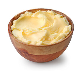 Image showing fresh butter in wooden bowl