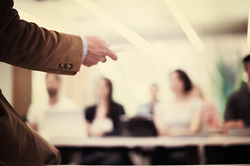 Image showing close up of teacher hand while teaching in classroom