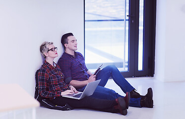 Image showing startup business, couple working on laptop computer at office