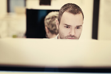 Image showing startup business, software developer working on desktop computer