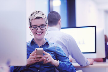 Image showing startup business, woman  working on desktop computer