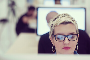 Image showing startup business, woman  working on desktop computer