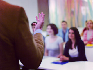 Image showing close up of teacher hand while teaching in classroom