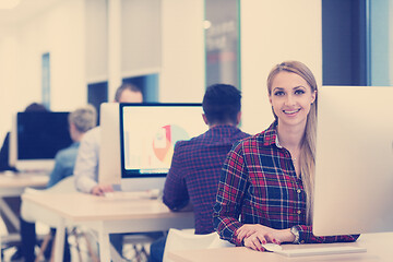 Image showing startup business, woman  working on desktop computer