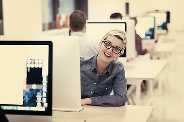 Image showing startup business, woman  working on desktop computer