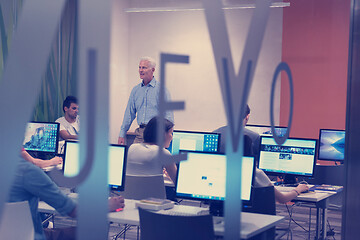 Image showing technology students group working in computer lab school  classr