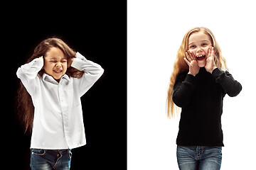 Image showing portrait of two happy girls on a white and black background