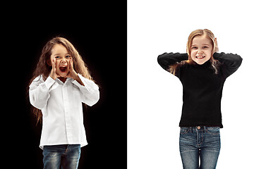 Image showing portrait of two happy girls on a white and black background