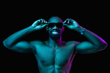 Image showing Close up portrait of a young naked african man indoors