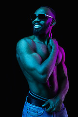 Image showing Close up portrait of a young naked african man indoors