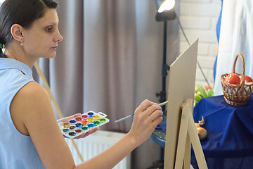 Image showing Girl in the studio draws still life watercolor