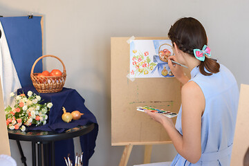 Image showing artist draws still life watercolor paints on easel