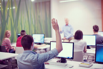 Image showing student answering a question in classroom