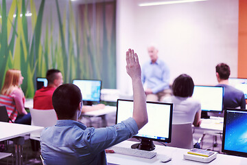 Image showing student answering a question in classroom