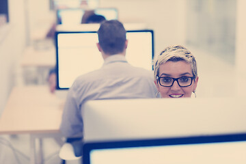 Image showing startup business, woman  working on desktop computer