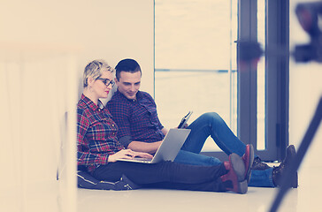 Image showing startup business, couple working on laptop computer at office