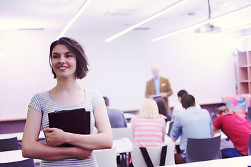 Image showing portrait of happy female student in classroom