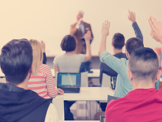 Image showing students group raise hands up on class