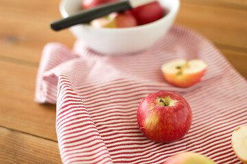 Image showing apples and kitchen knife on towel