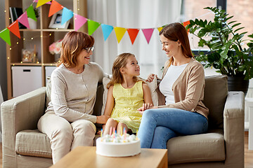 Image showing mother, daughter and grandmother at birthday party