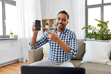 Image showing male blogger with smartphone videoblogging