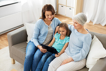 Image showing mother, daughter and grandmother with tablet pc