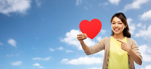 Image showing happy asian woman with red heart