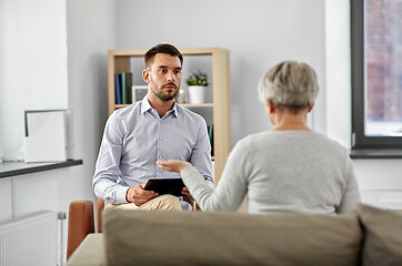 Image showing psychologist listening to senior woman patient