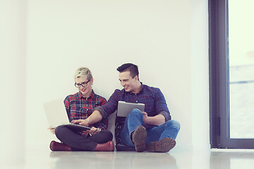 Image showing startup business, couple working on laptop computer at office