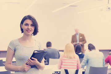 Image showing portrait of happy female student in classroom