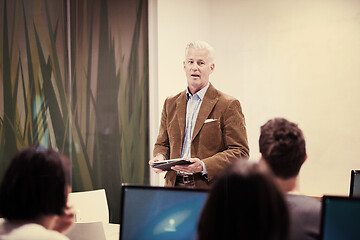 Image showing teacher and students in computer lab classroom