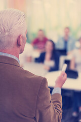 Image showing teacher with a group of students in classroom