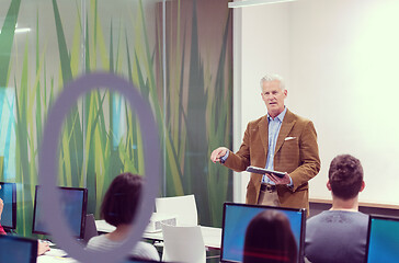 Image showing teacher and students in computer lab classroom