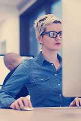 Image showing startup business, woman  working on desktop computer