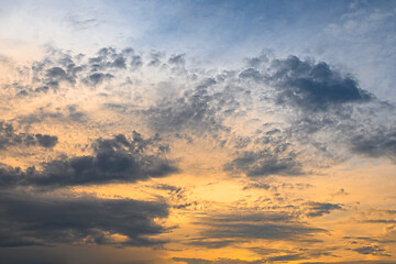 Image showing Blue, yellow and orange sunset with clouds