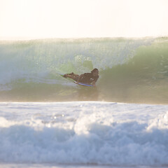 Image showing Body surfer riding a perfect wave.