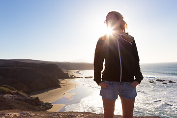 Image showing Free happy woman winter vacation on La Pared beach, Fuerteventura, Canary Islands, Spain.