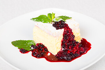 Image showing Cremeschnitte with Berries Sauce and Green Mint.
