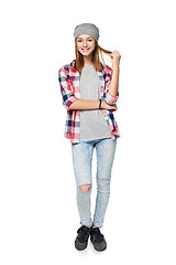 Image showing Smiling relaxed teen girl standing in full length