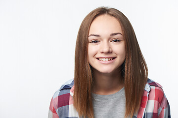 Image showing Closeup of happy smiling teen girl looking at camera