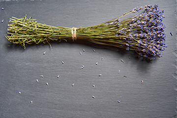 Image showing A bunch of lavender flowers on on stone surface