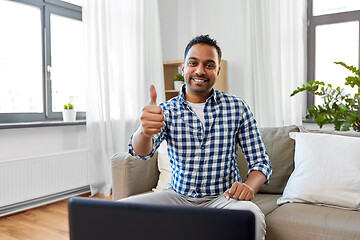 Image showing indian male blogger showing thumbs up at home
