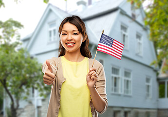 Image showing happy asian woman with american flag