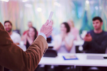 Image showing close up of teacher hand while teaching in classroom