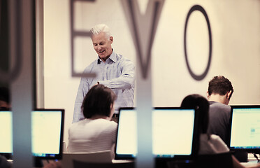 Image showing teacher and students in computer lab classroom